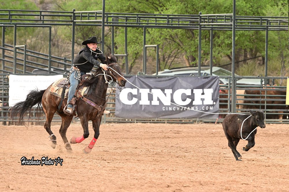Jake Szuk roping at CINCH event